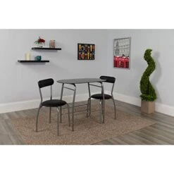 Flash Furniture Sutton 3 Piece Space-Saver Bistro Set With Black Glass Top Table And Black Vinyl Padded Chairs