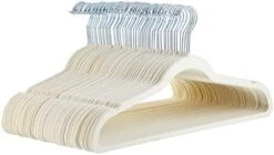 Amazon Basics Slim, Velvet, Non-Slip Suit Clothes Hangers, Black/Silver - Pack Of 50 -Songmics Furniture Shop 41xZ6SrVoPL. AC