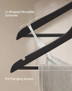 SONGMICS Wooden Hangers, 20-Pack Wood Coat Hangers With Shoulder Notches, Swivel Hook, Non-Slip For Jackets, Shirts, Suits, Black And Silver UCRW02B-20 -Songmics Furniture Shop 51U4LlMUlOL